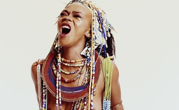 South African pop icon Brenda Fassie photographed in New York City in 1989 by Janette Beckman—channeling township vulnerability, oral history, and raw emotional power through traditional attire and vocal defiance.